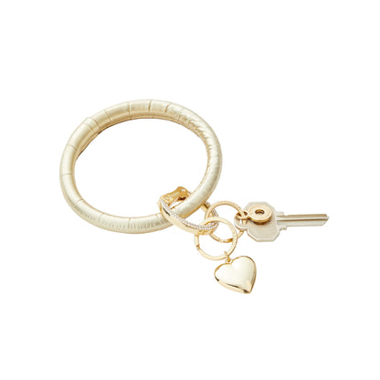 Puffy heart key chain. Can be added to your big o Key ring. Shown here in Solid gold rush leather with a gold puffy heart and key attached.